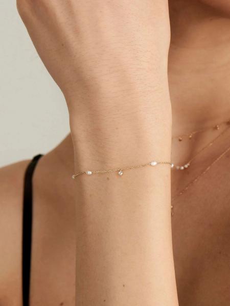 Ania Haie käevõru Radiance BAU003-01YG - Premiumkellad